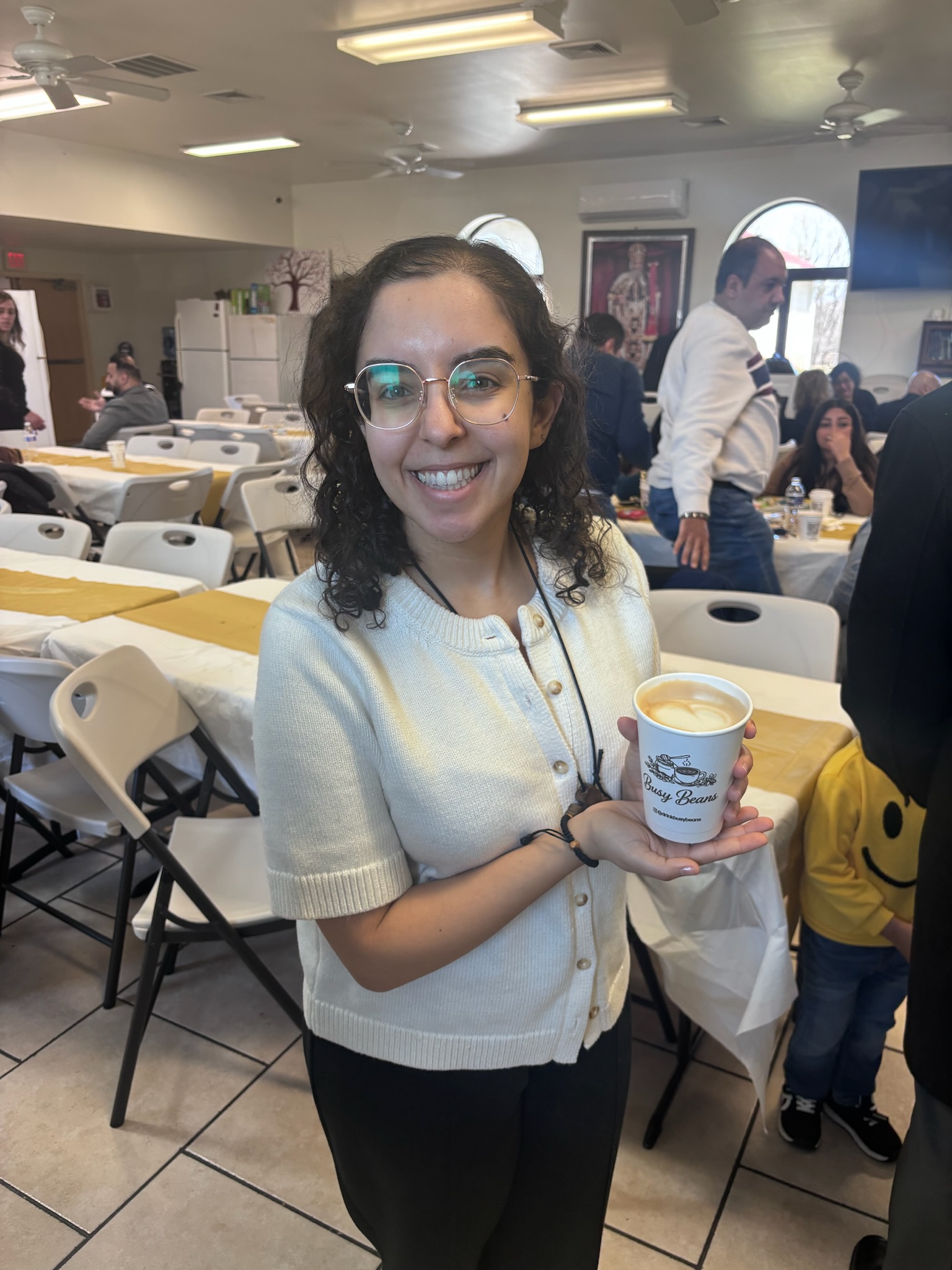 Happy guest with Busy Beans cup